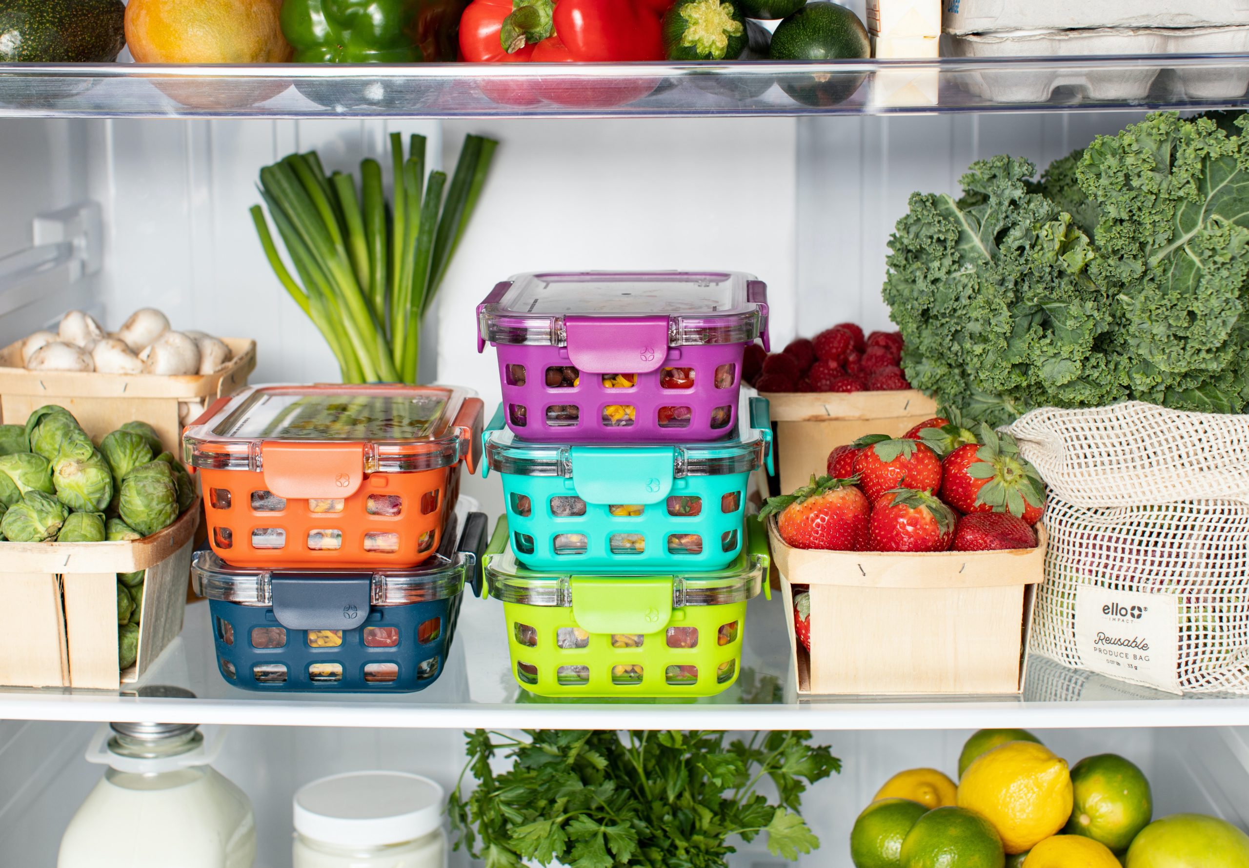 an organized fridge with basket and containers