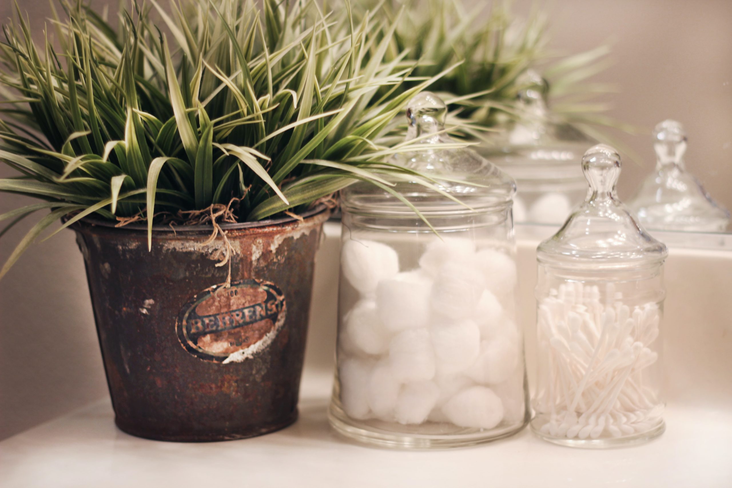 Jars organizing things in a bathroom