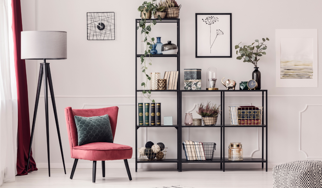 Cool black shelf in a living room with a chair and a lamp